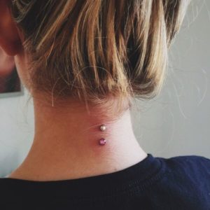 Nape of Neck Dermal Piercing at Almost Famous Body Piercing