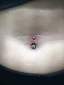 Navel Piercing - Almost Famous Body Piercing
